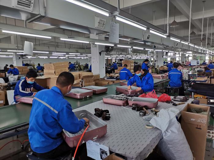 Victorlite Busy luggage assembling line and hard-working staffs